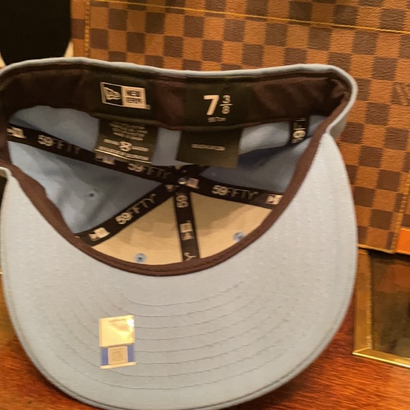 Pre-owned NC sport cap size 7 3/8. Some spots but still overall good . - Picture 4 of 7